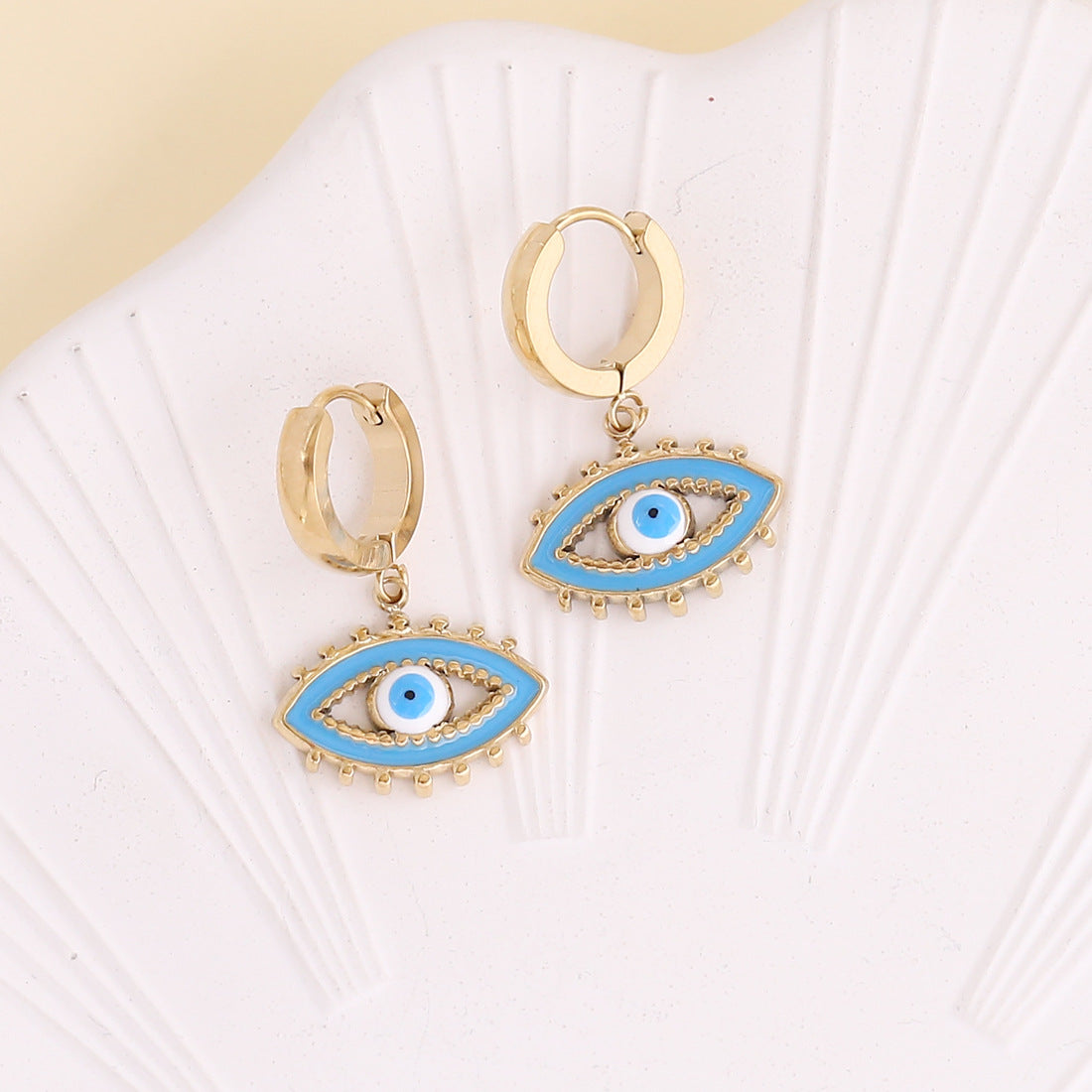 Pendientes de acero inoxidable de ojo de diablo de goteo de aceite de joyería al por mayor